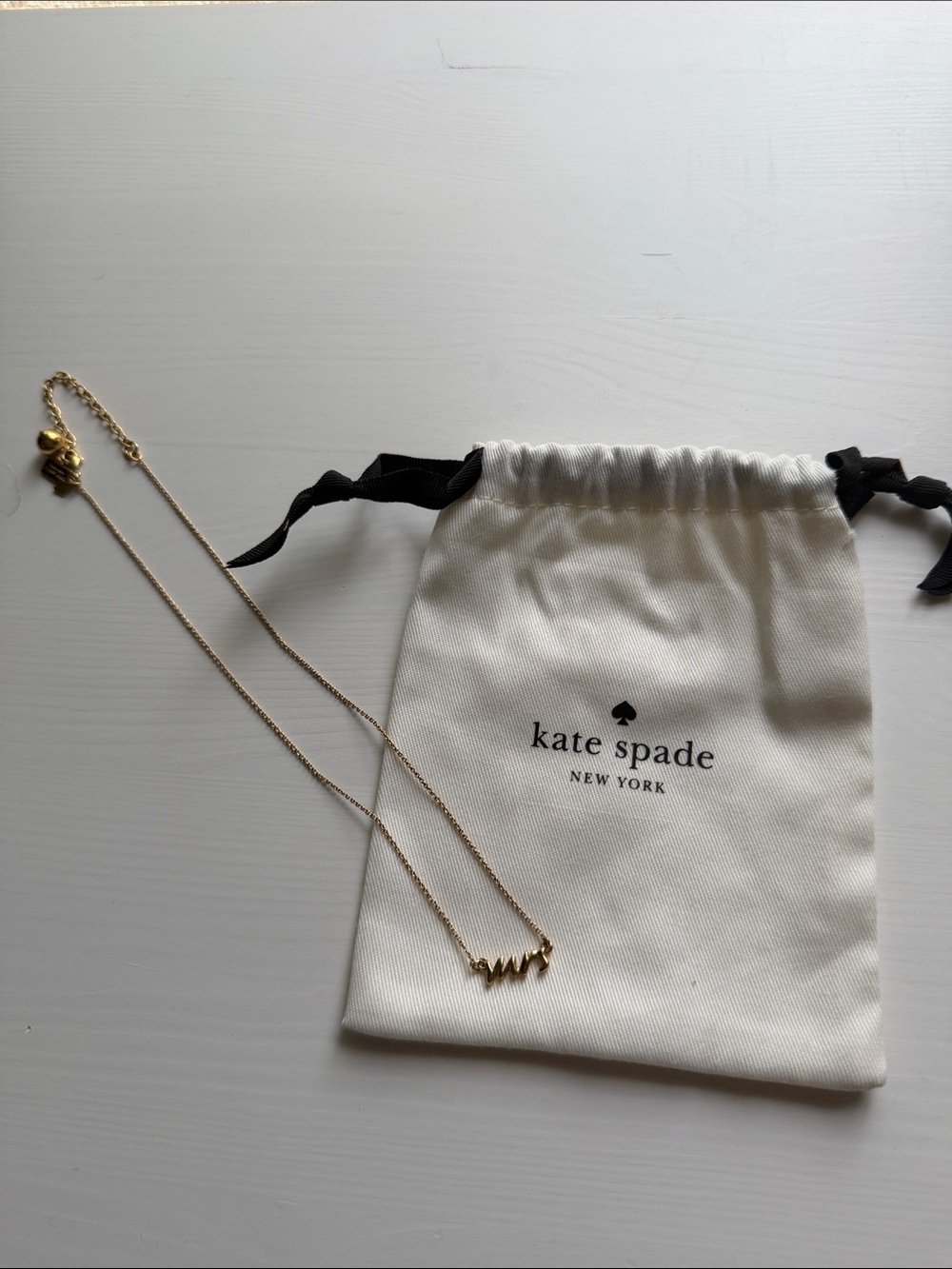 Kate Spade New York Gold Tone “MRS” Script Necklace with Dust Bag